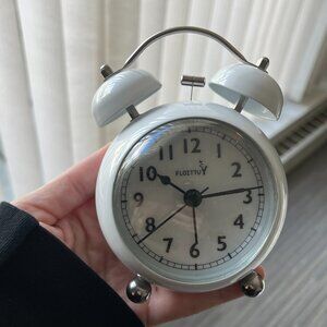 analog white alarm clock